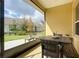 Relaxing screened patio with outdoor furniture at 1010 Nantucket Sound, Mount Dora, FL 32757