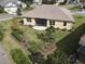 House with backyard landscaping and patio at 1010 Nantucket Sound, Mount Dora, FL 32757
