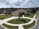 One-story home with a two-car garage and circular driveway at 1010 Nantucket Sound, Mount Dora, FL 32757