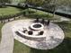 Relax and socialize by the community fire pit at 1010 Nantucket Sound, Mount Dora, FL 32757