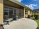 Screened patio with seating area and backyard view at 1010 Nantucket Sound, Mount Dora, FL 32757