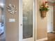 Elegant pantry with frosted glass door and decorative accents at 1010 Nantucket Sound, Mount Dora, FL 32757