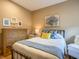 Charming bedroom with a queen bed and built in dresser at 1010 Nantucket Sound, Mount Dora, FL 32757