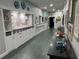 Community hallway with bulletin board and storage at 21630 King Henry Ave, Leesburg, FL 34748