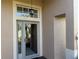 Front door entry with glass and sidelights at 21630 King Henry Ave, Leesburg, FL 34748