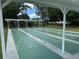 Shuffleboard courts under covered pavilion at 21630 King Henry Ave, Leesburg, FL 34748