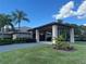Community clubhouse exterior with landscaping at 21630 King Henry Ave, Leesburg, FL 34748