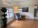 Dining area with hardwood floor and window seat at 21630 King Henry Ave, Leesburg, FL 34748