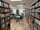 Community library with bookshelves and seating at 21630 King Henry Ave, Leesburg, FL 34748