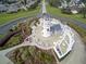Community aerial view showing lighthouse and homes at 3332 Flagship Ave, Tavares, FL 32778