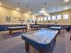 Community game room featuring multiple billiard tables at 3332 Flagship Ave, Tavares, FL 32778