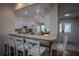 Kitchen with a breakfast bar and whitewashed wood accents at 3332 Flagship Ave, Tavares, FL 32778