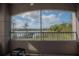 Relaxing screened balcony overlooking lake and trees at 3406 Soho St # 102, Orlando, FL 32835