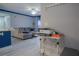 Living room features a comfortable couch and a printer station at 3406 Soho St # 102, Orlando, FL 32835