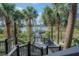 Steps leading down to a scenic lake view at 3406 Soho St # 102, Orlando, FL 32835