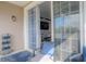 Private balcony with comfortable seating and lake view at 3406 Soho St # 102, Orlando, FL 32835
