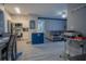Open concept living area with kitchen, dining and living room at 3406 Soho St # 102, Orlando, FL 32835