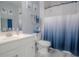Clean bathroom with white vanity, toilet and shower/tub combo at 3406 Soho St # 102, Orlando, FL 32835