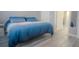 King-size bed, light walls, and lots of natural light at 3406 Soho St # 102, Orlando, FL 32835