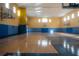 Indoor basketball court with polished floors at 3406 Soho St # 102, Orlando, FL 32835