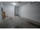 Empty garage with light-grey walls and floor at 3406 Soho St # 102, Orlando, FL 32835