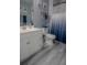 Clean bathroom with white vanity, toilet and shower/tub combo at 3406 Soho St # 102, Orlando, FL 32835