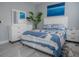 Bedroom with white dresser and a lake themed bedding set at 3406 Soho St # 102, Orlando, FL 32835