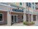 Community clubhouse entrance with double doors at 3406 Soho St # 102, Orlando, FL 32835