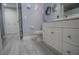 Bathroom features a white vanity and grey flooring at 3406 Soho St # 102, Orlando, FL 32835