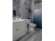 Clean bathroom with white vanity, toilet and shower/tub combo at 3406 Soho St # 102, Orlando, FL 32835