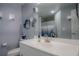 Clean bathroom with white vanity, shower, and toilet at 3406 Soho St # 102, Orlando, FL 32835