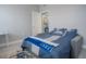 Bedroom with a daybed and access to a small bathroom at 3406 Soho St # 102, Orlando, FL 32835