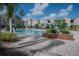 Resort-style pool with lounge chairs, and a gazebo at 3406 Soho St # 102, Orlando, FL 32835