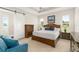 Spacious main bedroom with a ceiling fan and large windows at 38805 Ranch Gate Blvd, Umatilla, FL 32784