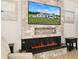 Modern linear fireplace with a stone surround and built-in shelving at 38805 Ranch Gate Blvd, Umatilla, FL 32784