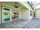 View of backyard and pool through open patio doors at 38805 Ranch Gate Blvd, Umatilla, FL 32784