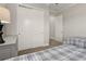 Cozy bedroom with a sliding door closet and two twin beds at 38805 Ranch Gate Blvd, Umatilla, FL 32784