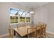 Light and airy dining room with large window and backyard view at 38805 Ranch Gate Blvd, Umatilla, FL 32784