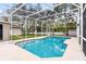 Inviting screened pool with ample deck space at 4516 Eagles Nest Rd, Fruitland Park, FL 34731