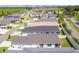 Community overview with various house styles and landscaping at 5238 Dalessandro Rd, The Villages, FL 32163