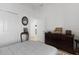 Well-lit bedroom with a dresser and a comfortable bed at 5238 Dalessandro Rd, The Villages, FL 32163