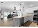 Modern kitchen with stainless steel appliances and island at 5238 Dalessandro Rd, The Villages, FL 32163