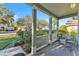 Inviting front porch with rocking chair, perfect for relaxing outdoors at 929 Magnolia Blossom Ct, Apopka, FL 32712