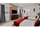 Bedroom with two twin beds and a red and white striped wall at 1603 Lima Ave, Kissimmee, FL 34747