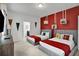 Two twin beds in a themed bedroom with Hogwarts decor at 1603 Lima Ave, Kissimmee, FL 34747