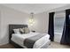 Bright bedroom with a comfortable bed, and plenty of natural light at 1603 Lima Ave, Kissimmee, FL 34747