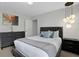 Spacious bedroom with dresser and window at 1603 Lima Ave, Kissimmee, FL 34747