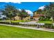 Residential street with houses and a soccer goal at 1603 Lima Ave, Kissimmee, FL 34747