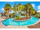 Enjoy resort-style living with this relaxing, palm-tree lined lazy river pool at 1603 Lima Ave, Kissimmee, FL 34747