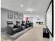 Home theater with reclining seats and large screen at 1603 Lima Ave, Kissimmee, FL 34747
